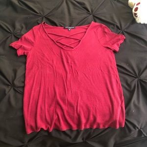 Cute top and is more of a maroon color then in the picture